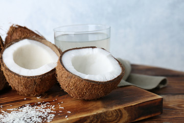 Fototapeta na wymiar Fresh coconuts on wooden board