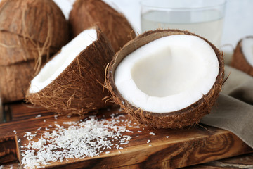 Fresh coconuts on wooden board