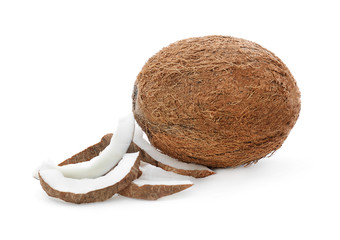 Whole coconut with pieces on white background