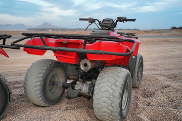 Modern quad bike in desert