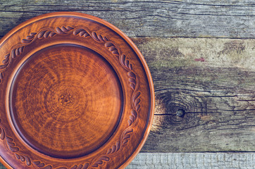 Clay dish on a wooden table