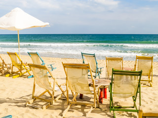 Beach chairs on the sandy beach