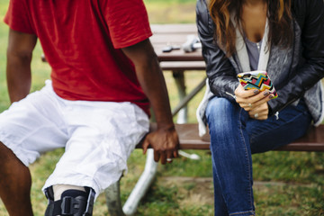 Tight shot of woman with mobile phone in hands