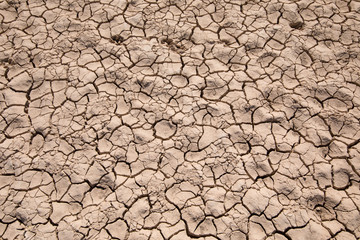 detail of dry earth ground background, drought in Entrepenas reservoir, in Guadalajara, Castilla, Spain Europe
