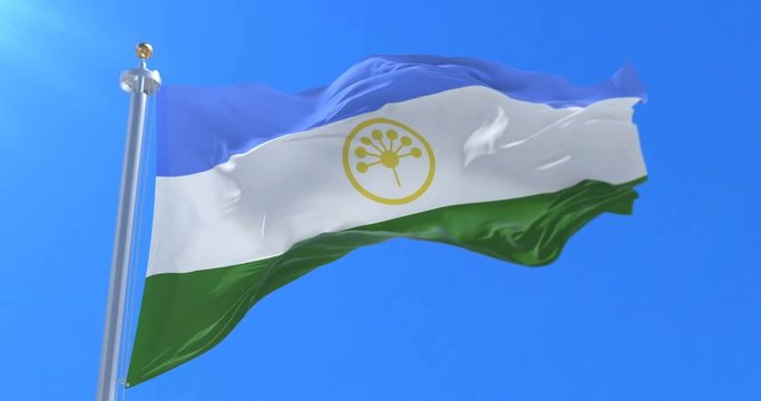Bashkortostan flag waving at wind in slow with blue sky, loop