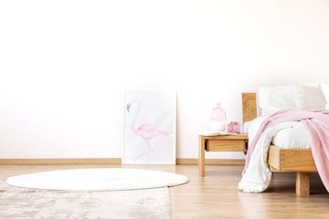 White bedroom with poster