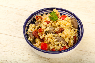 Bulgur with chicken hearts