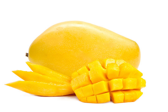 Yellow ripe Mango fruits and slice cubes isolated white background
