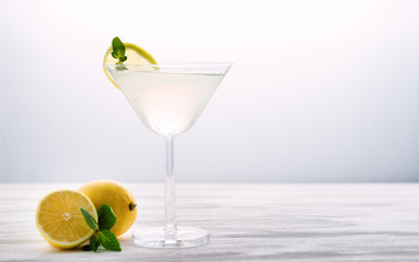 Citrus lemonade lemon cocktail on white background