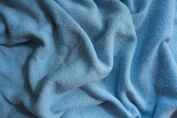 Draped sky blue fabric without prints or patterns
