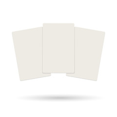 Three realistic blank plastic credit cards flying on a white background.