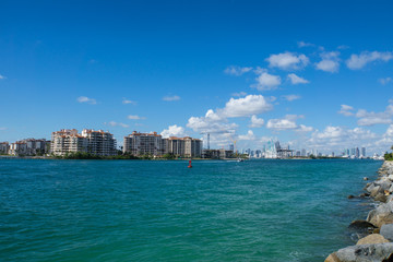 USA, Florida, Miami beach port entrance with skyline and houses and waterfront