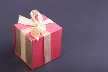 Gift boxes with bow on wood background