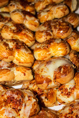 Buns with cheese and spices. Selective focus.