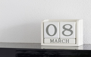 White block calendar present date 8 and month March