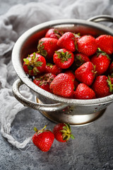 Ripe strawberry in colander
