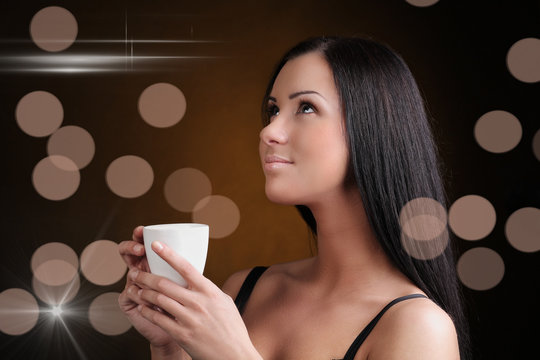 Beautiful Woman with cup of Coffee