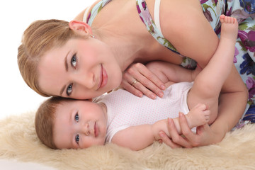 happy mother holding her baby