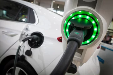 Photo sur Plexiglas Voitures rapides Charging an electric car