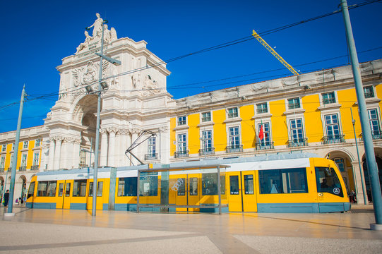 Yellow tram 28 on streets of Lisbon, Portugal