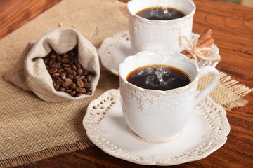hot black coffee in a retro cup with vanilla