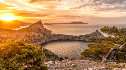 Seascape at sunrise in the mountains