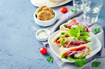 Baked Falafel vegetables lemon Tahini sauce Pita sandwich
