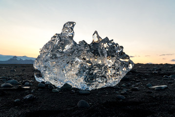 Detail of a glacial fragment of ice at Jokulsarlon glacier black diamond beach, Iceland