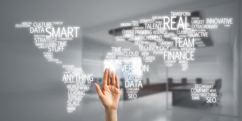 World map in office interior as symbol for international business and globalization