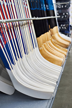 Hockey sticks in sport shop