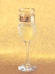 Golden vintage champagne glasses. Happy New Year 
