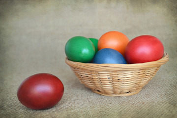 Easter basket with colorful Easter eggs