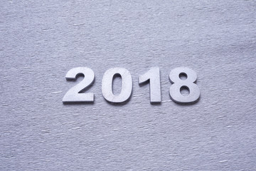 silver numbers forming the number 2018