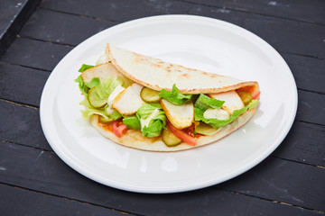sandwich wrap with meat and vegetables