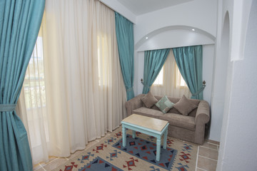 Lounge area of luxury hotel resort room