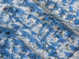 Aerial view over Druskininkai suburban houses during snowy cold winter, Lithuania.