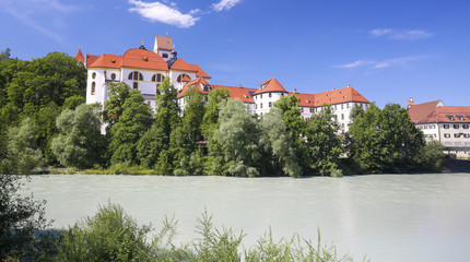 Fototapeta na wymiar Monastery and Lech River in Fussen in Bavaria, Germany