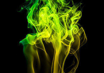 Obraz premium Colored smoke on black background