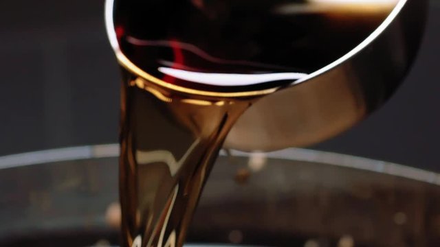 pouring a cup of rum