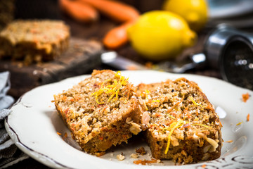 Slices of carrot cake served for Easter celebration.