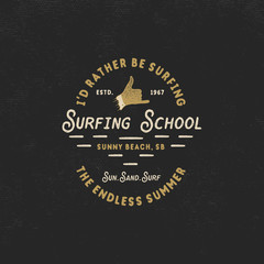 Fototapeta na wymiar Surfing school vintage emblem. Retro logo design with shaka sign and typography elements. Stock isolated on dark old style background
