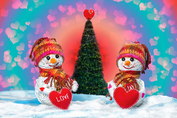 Love snowmen. Snowfall. Love concept. Valentine's Day Greeting card