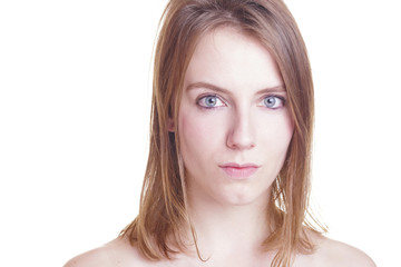 Fototapeta premium Positive blonde woman looking to the camera. Isolated, over a white wall.