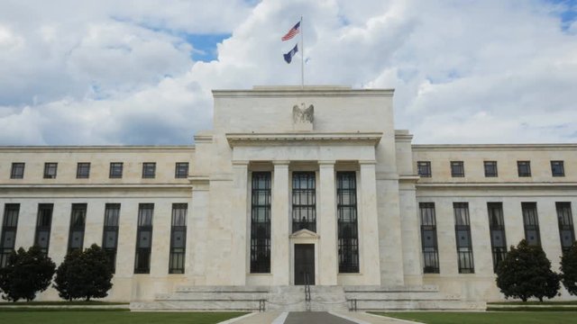 front on view of the exterior of the federal reserve building in washington, dc