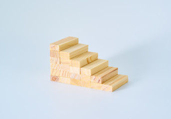 Wooden block stair isolated on white background.