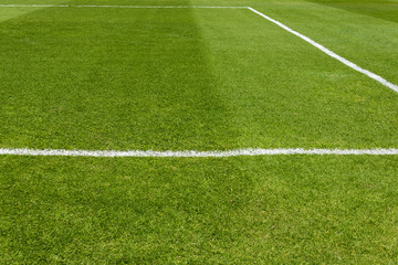 Obraz premium Corner of football field. green grass