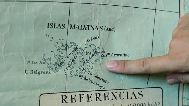 Argentinian Map Detail of Falkland Islands with Finger Pointing Close Up