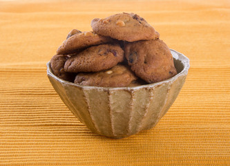 Chocolate chips cookies on background