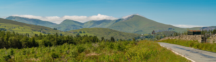 Fototapeta na wymiar View over Snowdonia landscape from a country road near Deiniolen, Gwynedd, Wales, UK