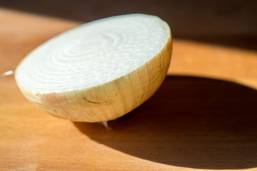 onion half cutting board
